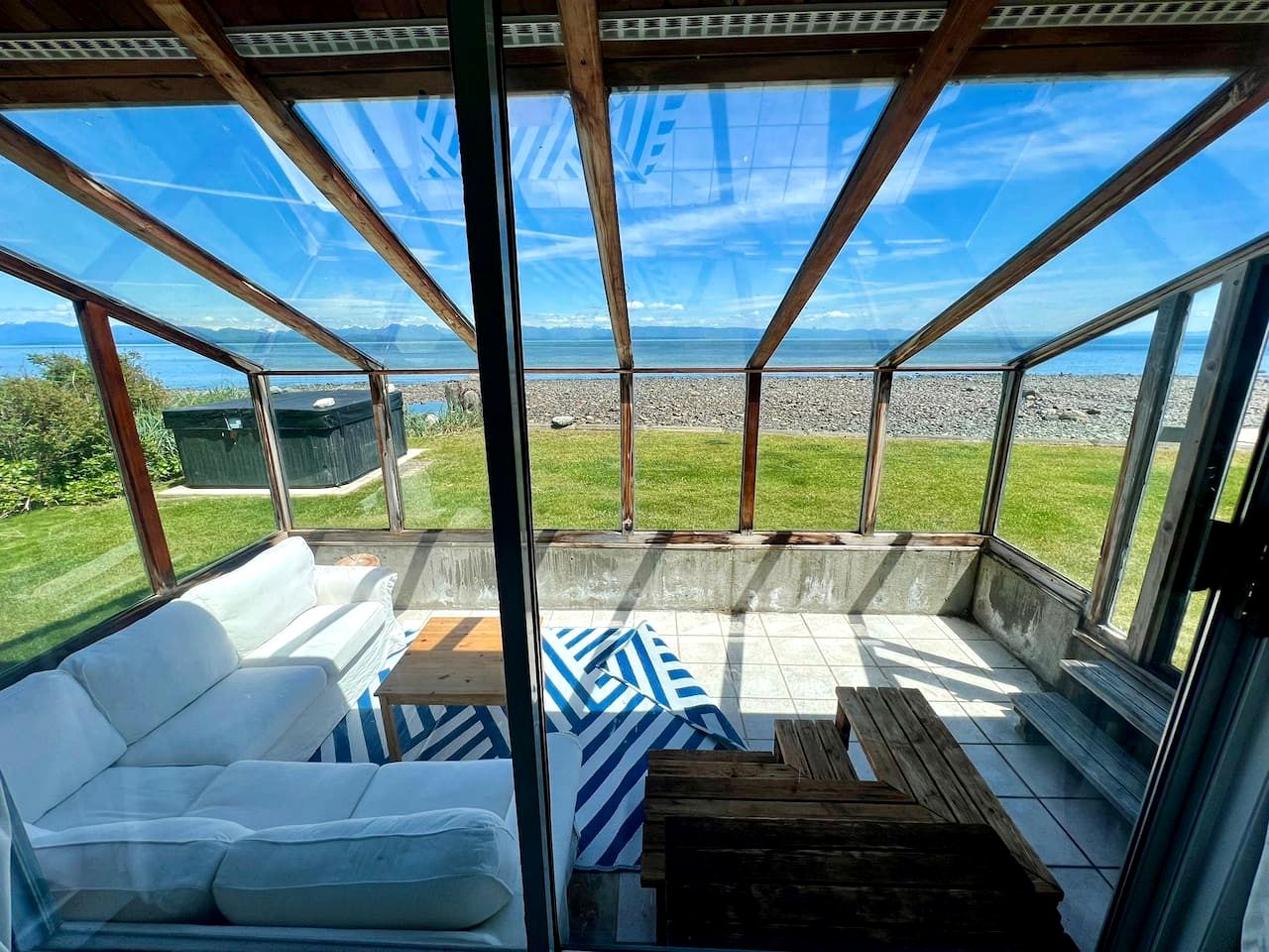 Coastal Oceanfront Retreat with Pebble Beach Access Located Near Stories Beach in Campbell River, BC