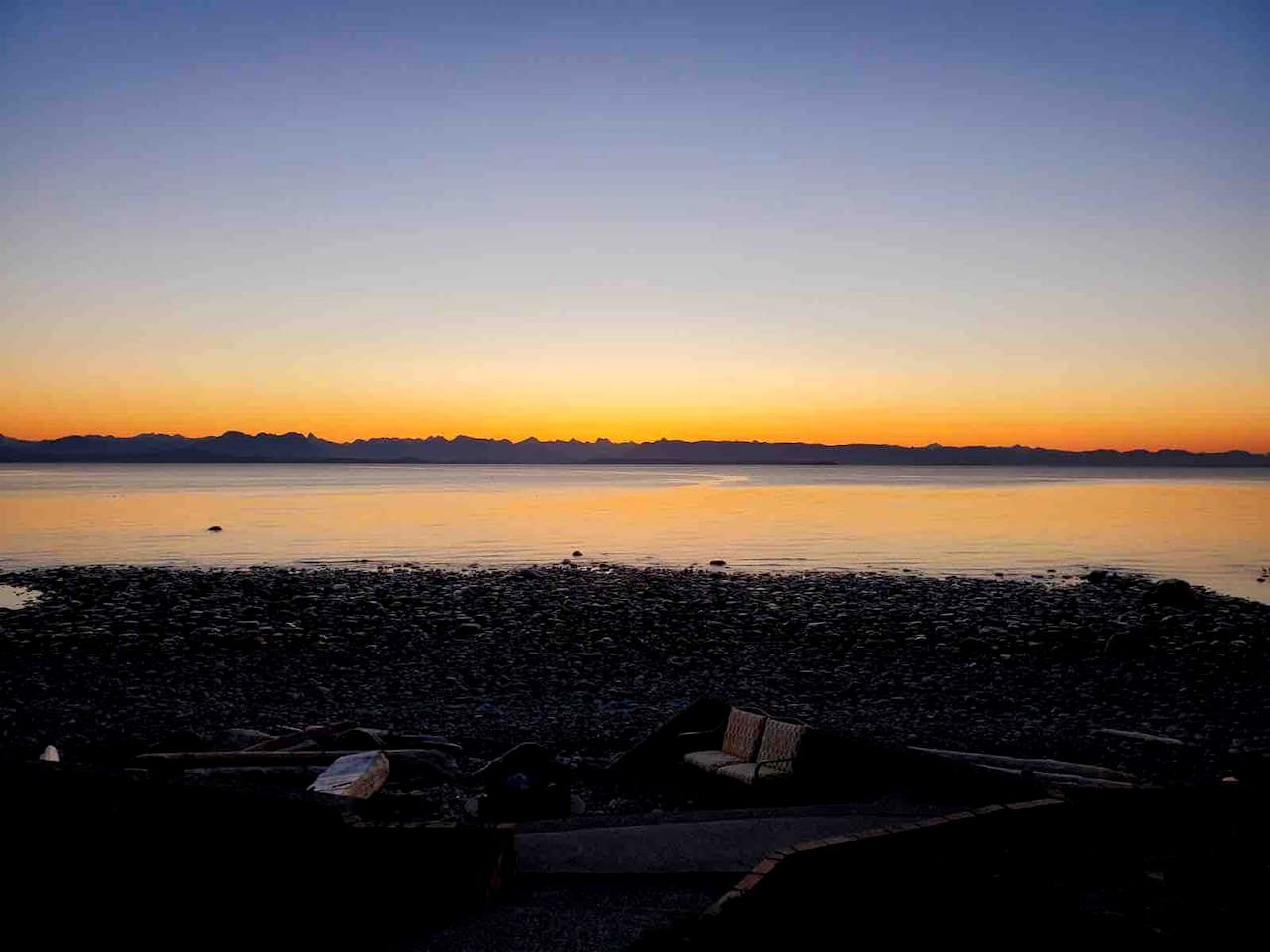 Coastal Oceanfront Retreat with Pebble Beach Access Located Near Stories Beach in Campbell River, BC