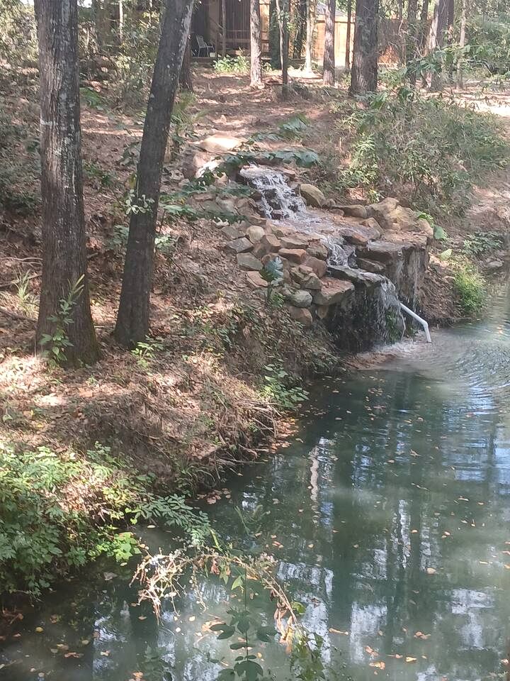 Tranquil Creekside Container with Private Waterfall Near Renaissance Festival | Magnolia, Texas