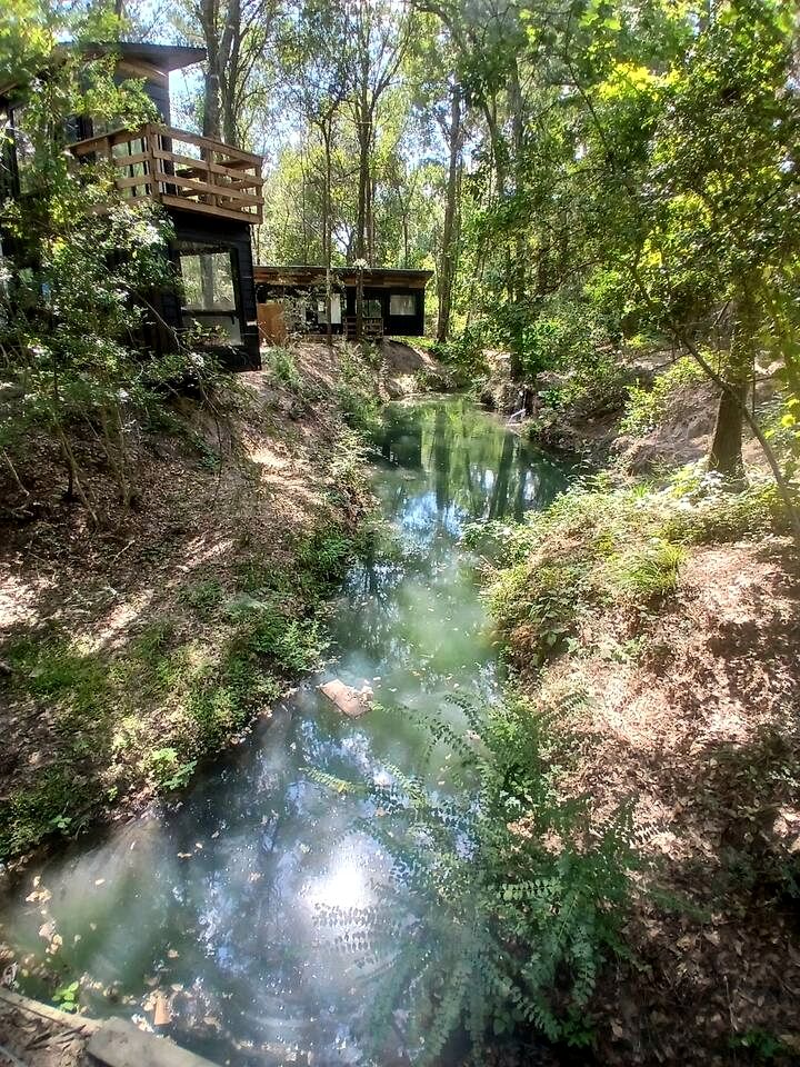 Tranquil Creekside Container with Private Waterfall Near Renaissance Festival | Magnolia, Texas