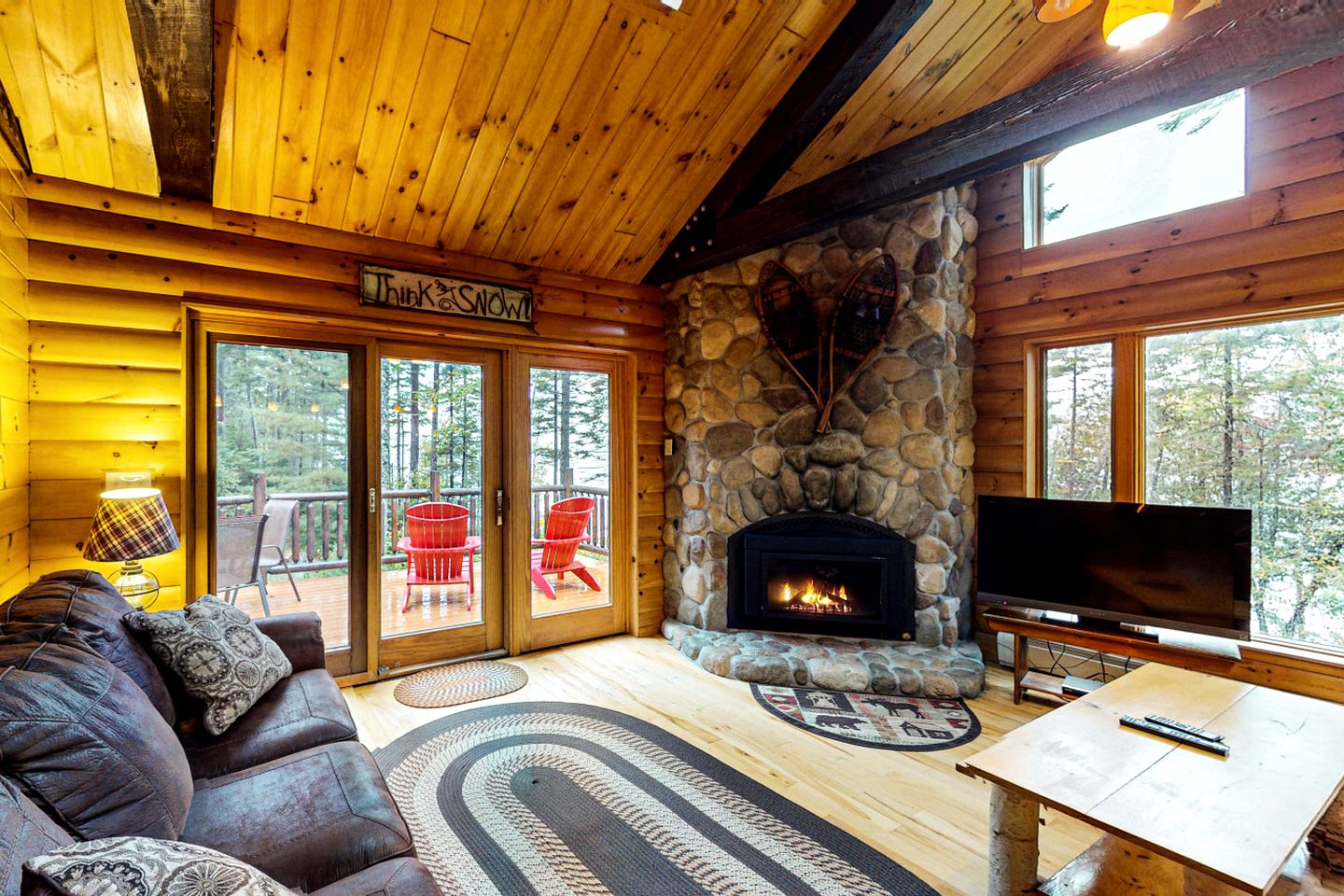 Waterfront Cabin with Private Deck Loaded with Kayaks in Maine