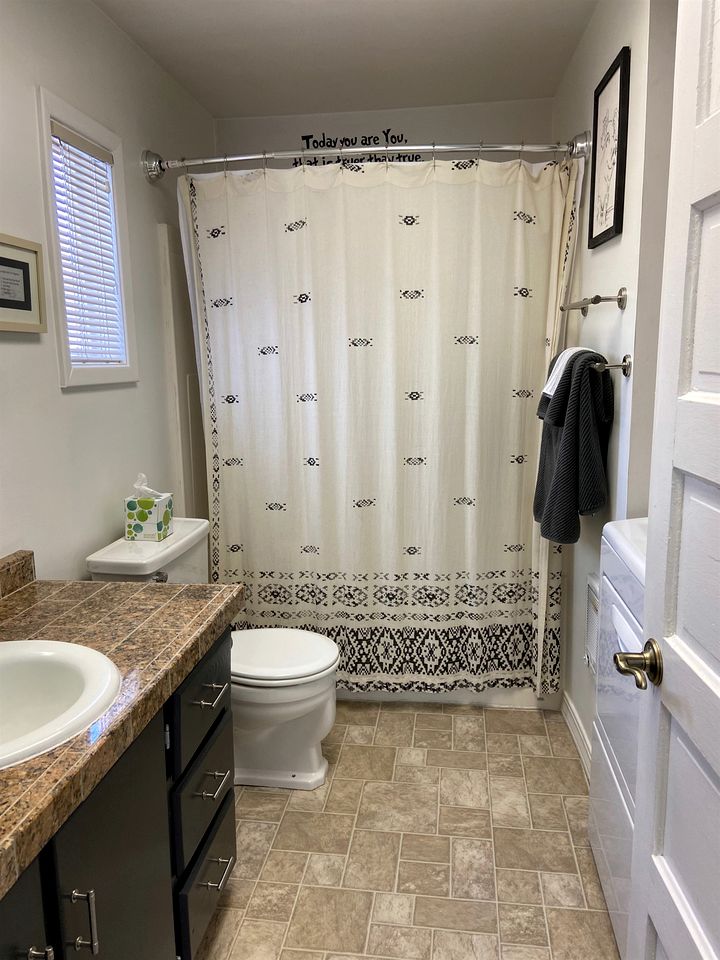 Charming Downtown Cottage with Porch & Backyard Retreat near Beaverhead River in Dillon, Montana