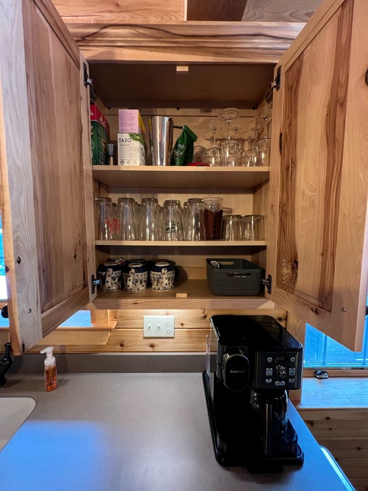 Wooden Lake Cabin Loaded with Kayaks in Maine