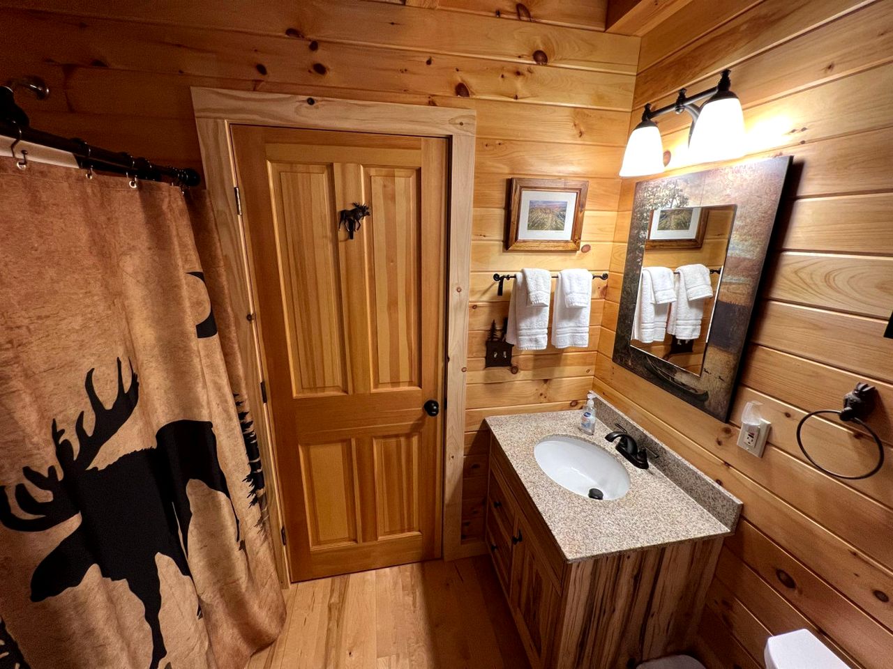 Wooden Lake Cabin Loaded with Kayaks in Maine