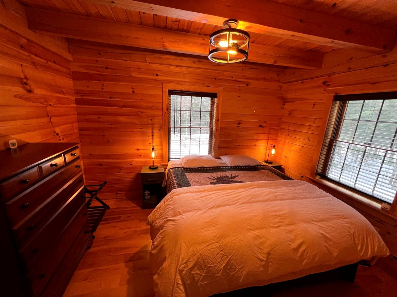 Wooden Lake Cabin Loaded with Kayaks in Maine