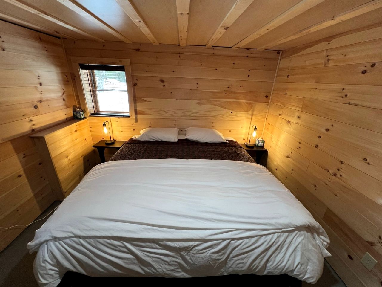 Wooden Lake Cabin Loaded with Kayaks in Maine