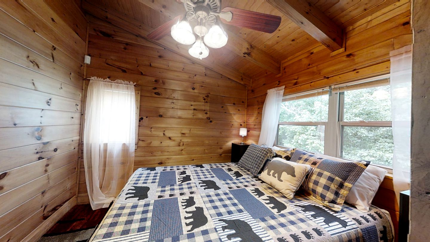 Elevate Your Tennessee Glamping Escape in this Lovely Riverside Cabin Rental in Newport