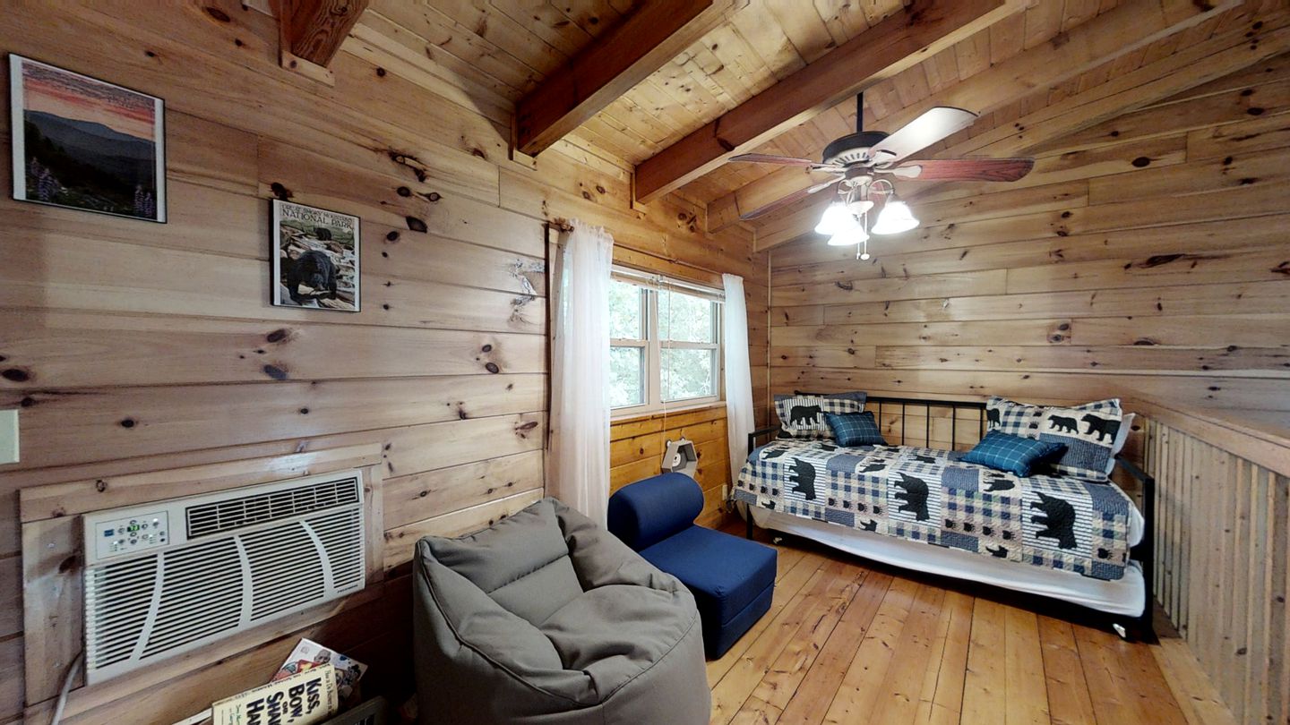 Elevate Your Tennessee Glamping Escape in this Lovely Riverside Cabin Rental in Newport