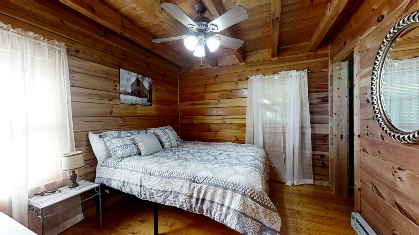 Elevate Your Tennessee Glamping Escape in this Lovely Riverside Cabin Rental in Newport